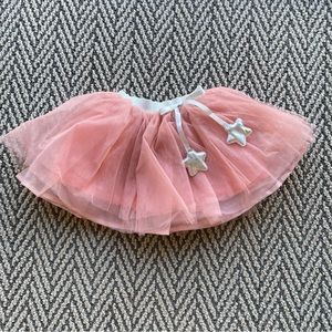 Little girls sparkly pink tool skirt with star tassels